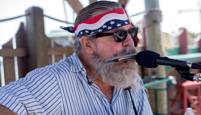 Man playing harmonica