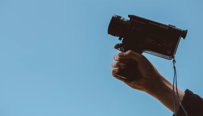 Person holding a camcorder